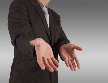  business man with an open hand as showing something concept