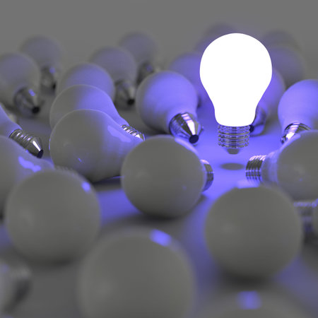 3d growing light bulb standing out from the unlit incandescent bulbs as leadership conceptの写真素材