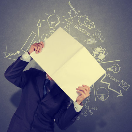 businessman hand show black cover book of success business as conceptの写真素材