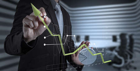 businessman hand working with new modern computer and business strategy as conceptの写真素材
