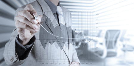 businessman hand working with new modern computer and business strategy as conceptの写真素材