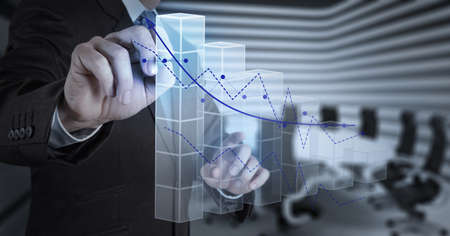 businessman hand working with new modern computer and business strategy as conceptの写真素材