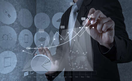 businessman hand working with new modern computer and business strategy as conceptの写真素材