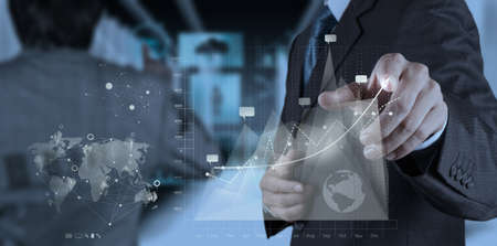 businessman hand working with new modern computer and business strategy as conceptの写真素材