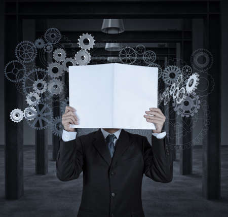 businessman hand draws gear to success conceptの写真素材