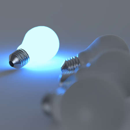 3d growing light bulb standing out from the unlit incandescent bulbs as leadership conceptの写真素材