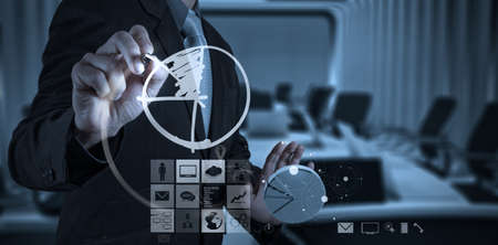 businessman hand working with new modern computer and business strategy as conceptの写真素材