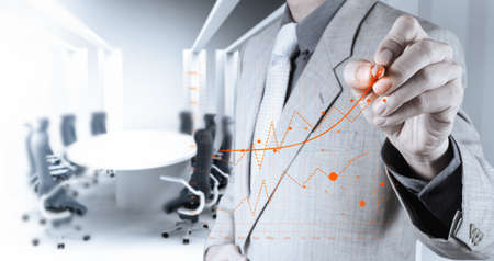businessman hand working with new modern computer and business strategy as conceptの写真素材