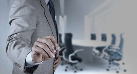 businessman hand working with new modern computer and business strategy as conceptの写真素材