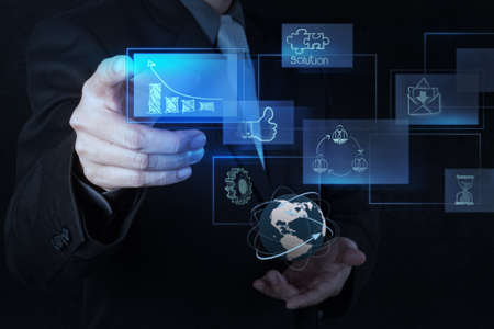 businessman hand working with new modern computer and business strategy as conceptの写真素材