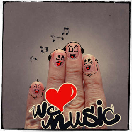 the happy finger couple in love with painted smiley and sing a song as vintage syleの写真素材
