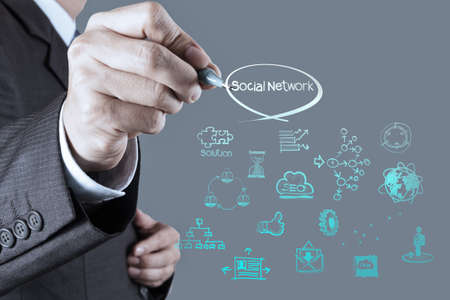 businessman working with new modern computer show social network structureの写真素材