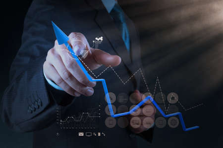 businessman hand working with new modern computer and business strategy as conceptの写真素材