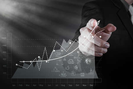 businessman hand working with new modern computer and business strategy as conceptの写真素材