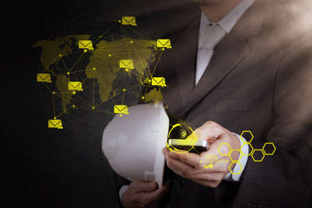 businessman hand use smart phone computer with email icon  as conceptの写真素材