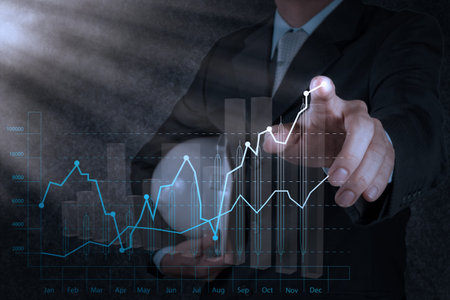 businessman hand working with new computer interface show building development conceptの写真素材