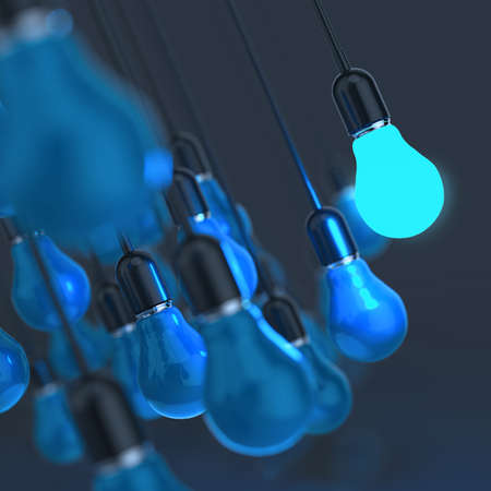 creative idea and leadership concept light bulb on grey backgroundの写真素材