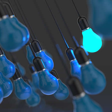 creative idea and leadership concept light bulb on grey backgroundの写真素材