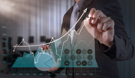 businessman hand working with new modern computer and business strategy as conceptの写真素材