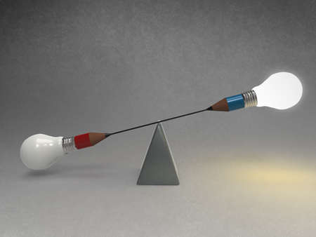 false balance of pencil lightbulb as vintage style conceptの写真素材