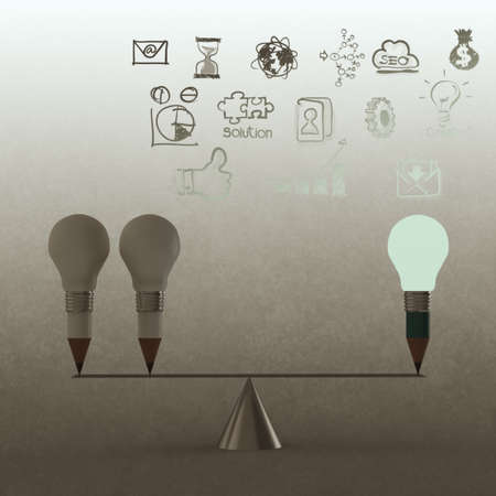 false balance of pencil lightbulb as vintage style conceptの写真素材