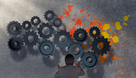 businessman working with gear and splash colors  as conceptの写真素材