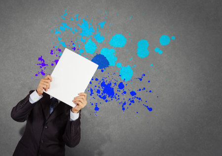 businessman with blank book and splash colors choice as conceptの写真素材
