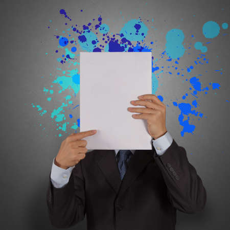 businessman with blank book and splash colors choice as conceptの写真素材
