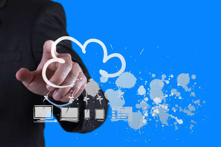 Businessman hand working with a Cloud Computing diagram on the new computer interface as conceptの写真素材