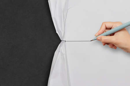 hand draws rope open wrinkled paper show blank  background as business conceptの写真素材