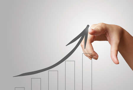  hand draws business success chart concept on virtual screen as conceptの写真素材