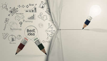 pencil lightbulb draw rope open wrinkled paper show business strategy as conceptの写真素材