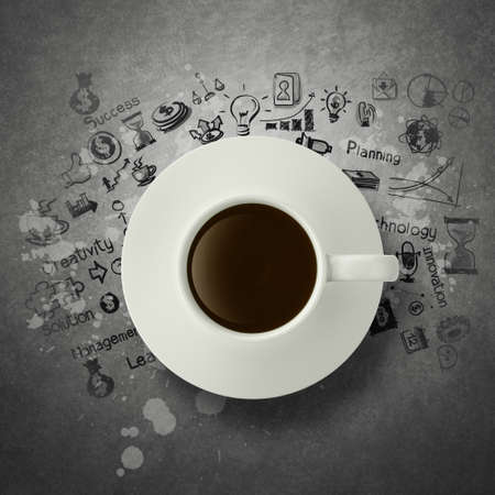 3d coffee cup on  business strategy diagram as conceptの写真素材