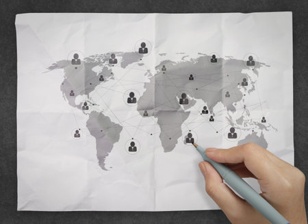 hand drawing social media icon on crumpled paper as concept