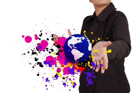 businesswoman shows the earth and splash colors as creative concept