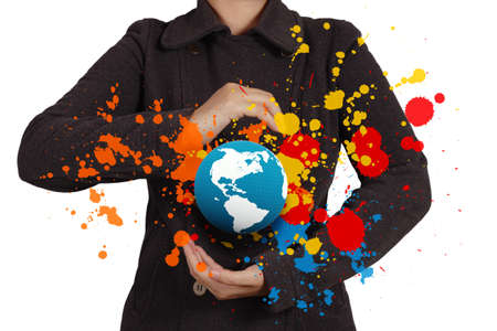businesswoman shows the earth and splash colors as creative conceptの写真素材