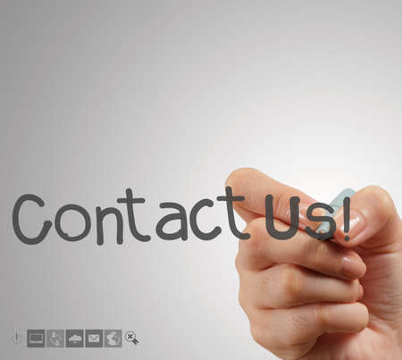 Hand writing Contact us as conceptの写真素材