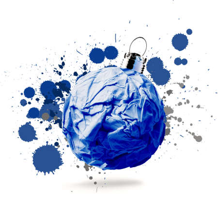 crumpled paper Christmas ornament on splash backgroundの写真素材