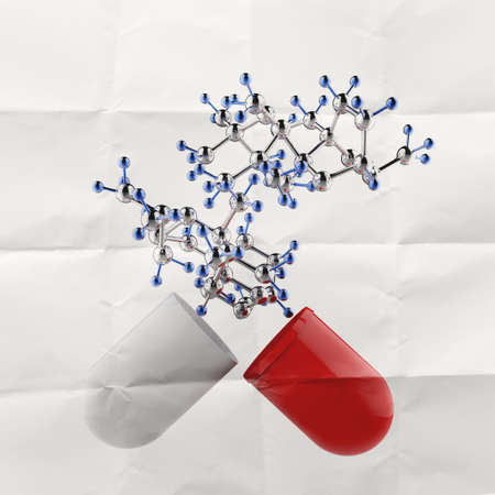 medical capsule and molecule structure on crumpled paper as conceptの写真素材