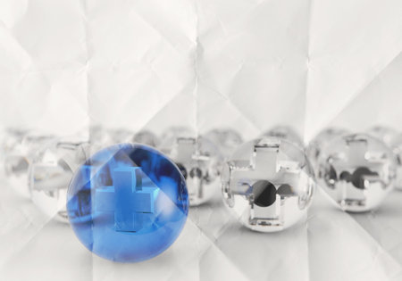 First aid medical sign on crumpled paper as medical conceptの写真素材