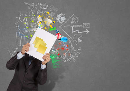 businessman hand show blank sticky note on book of success business as conceptの写真素材