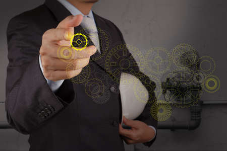 engineer point gear with the piping of an industrial waste water cleaning facility as conceptの写真素材