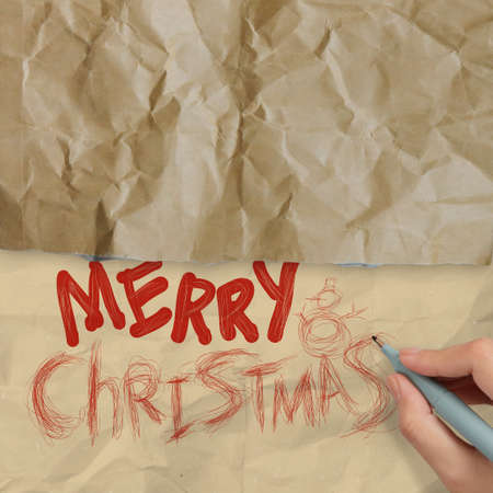 hand draws Christmas Card on wrinkled paper as vintage style conceptの写真素材