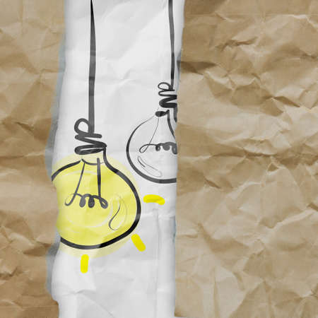 light bulb crumpled paper and recycle tear envelope as creative concept backgroundの写真素材