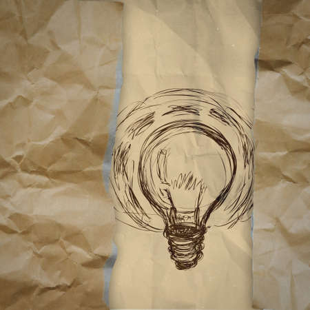 light bulb crumpled paper and recycle tear envelope as creative concept backgroundの写真素材