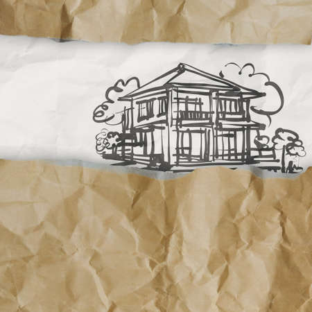 hand drawn house on wrinkled paper as conceptの写真素材
