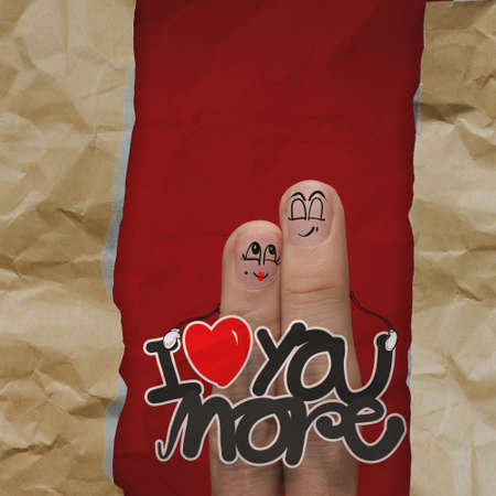 happy finger couple  on crumpled paper background as conceptの写真素材