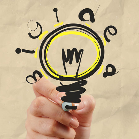 hand drawing light bulb with crumpled paper as creative conceptの写真素材