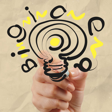 hand drawing light bulb with crumpled paper as creative conceptの写真素材