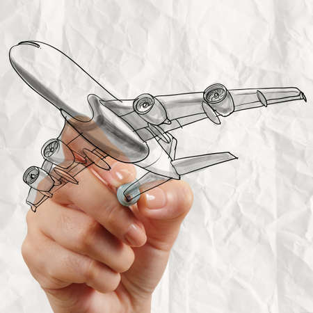 hand drawing airplane with crumpled paper background as conceptの写真素材